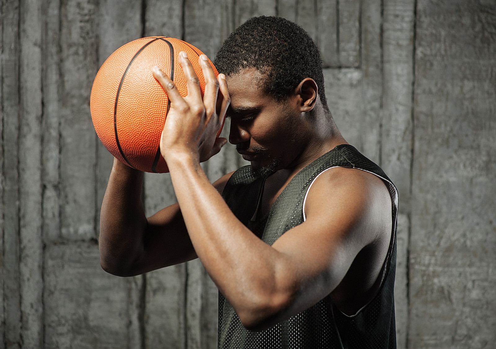 Basketball player thinking before a shot.