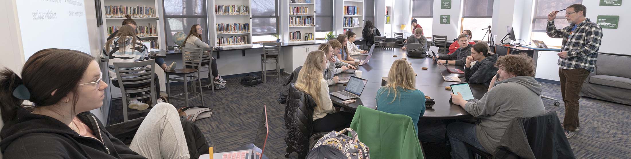 monitors with the word Teach