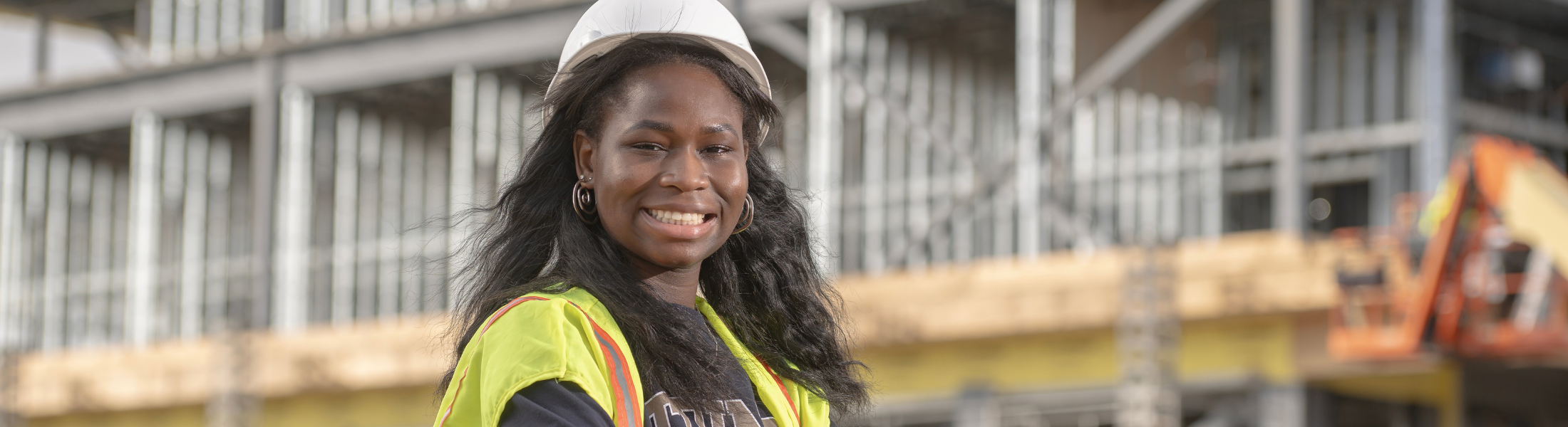 student in a safety vest