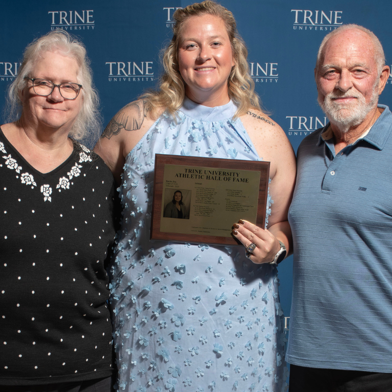 trine alumni receives an award from trine university president