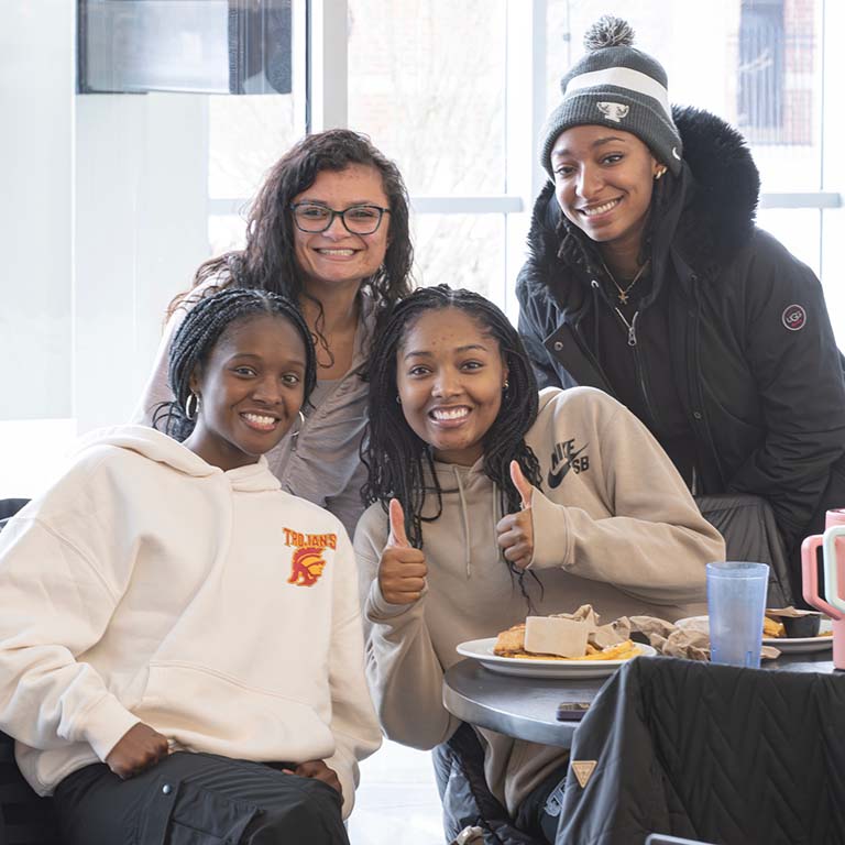 Students with thumbs up
