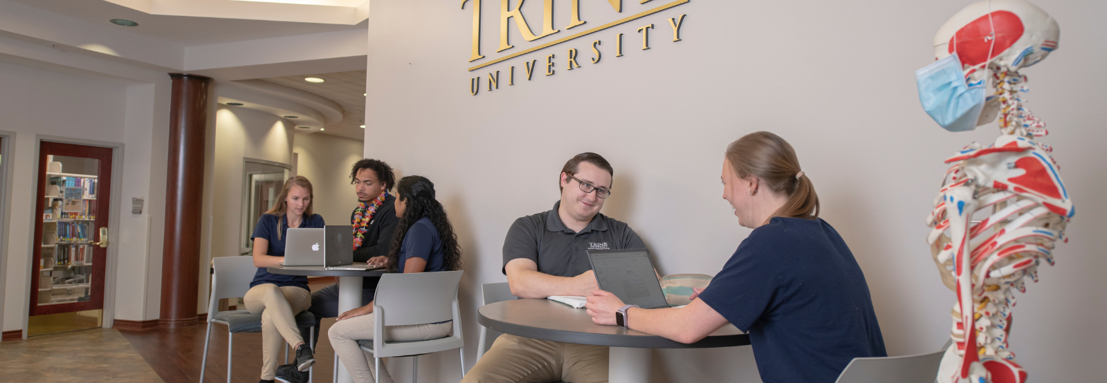 Professor talking with students