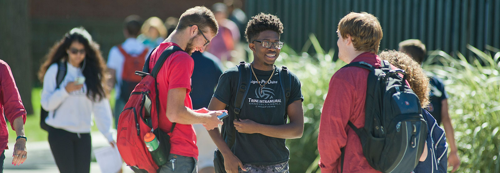 students talking on patio