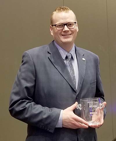 Jason with award