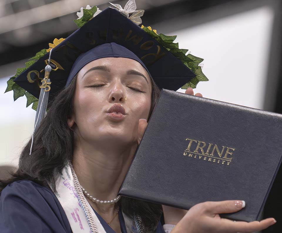 Graduate with diploma