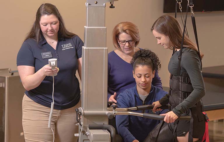 DPT students and Dr. Jodi Sandvik with PhysioGait system