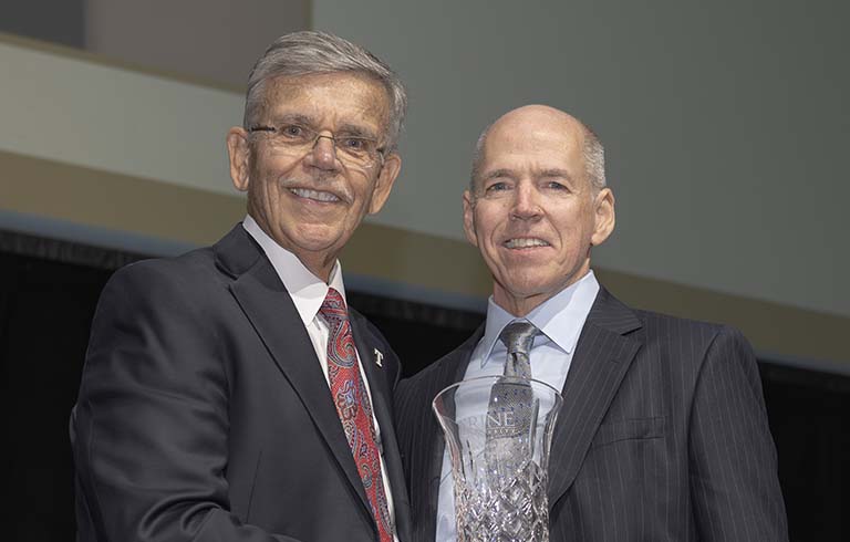 Dr. Brooks and Rick Henvey, Pillar of Success