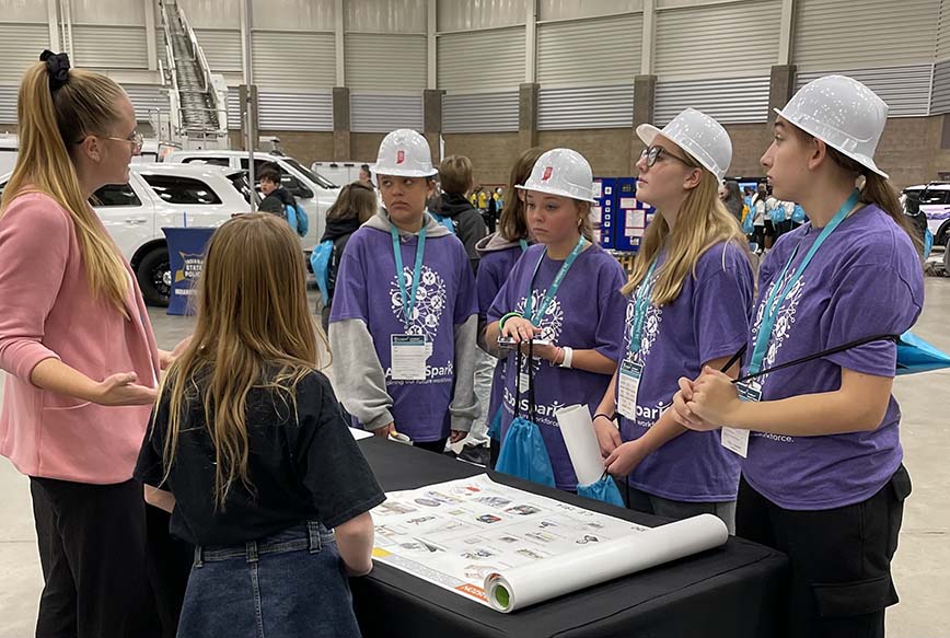 Teacher and students in Memorial Coliseum