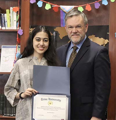 Areeba Kazi and Dr. Darrin Wilcox with Jannen Student Research Award