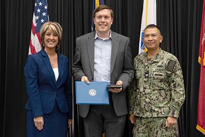 Dr. Angie Lewis, Alexander Ray and Capt. Rex Boonyobhas