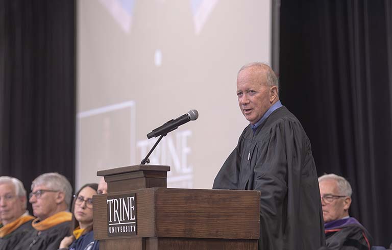 Mitch Daniels speaking at podium
