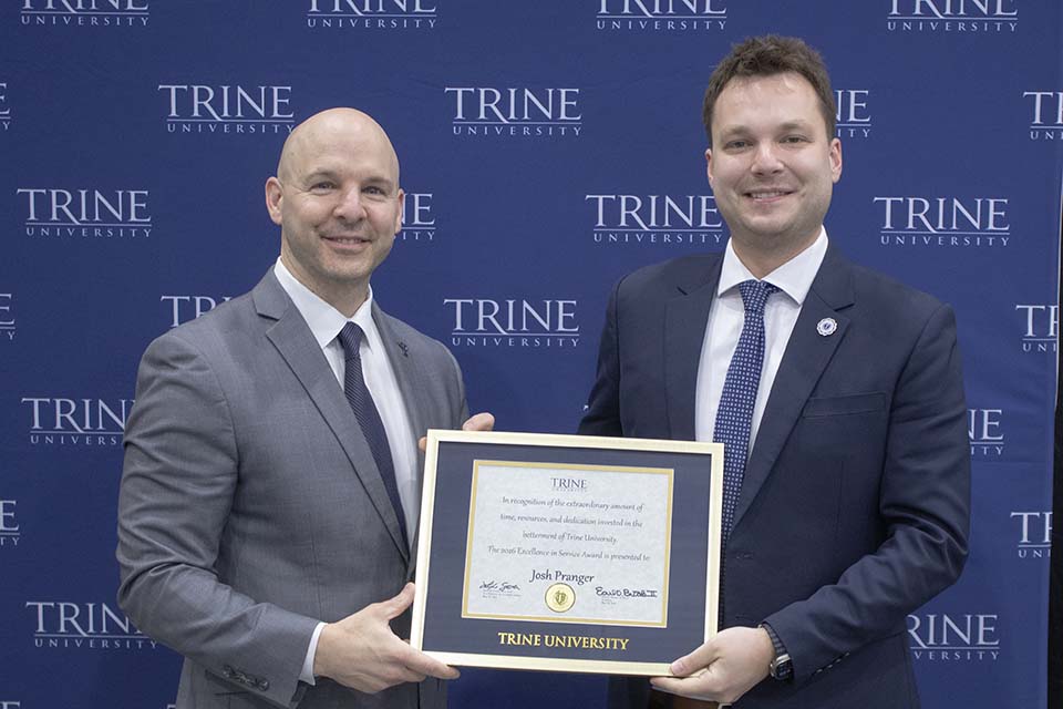 Dr. Kline presents award to Josh Pranger