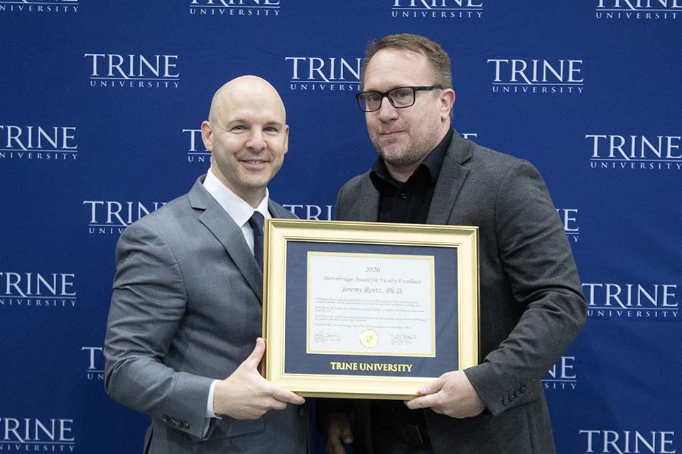Dr. Kline presents award to Dr. Rentz