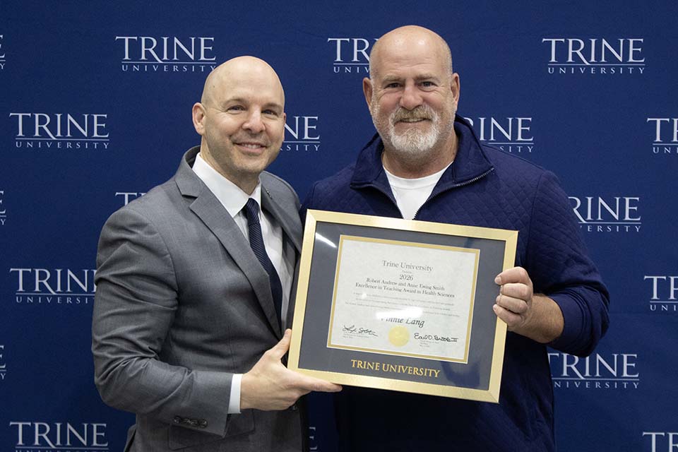 Dr. Kline presents award to Vinnie Lang