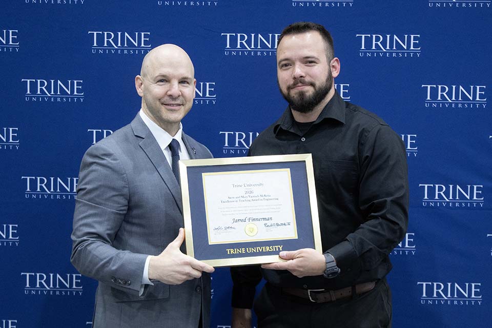 Dr. Kline presents award to Dr. Finnerman