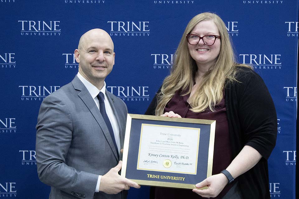 Dr. Kline presents award to Dr. Kelly