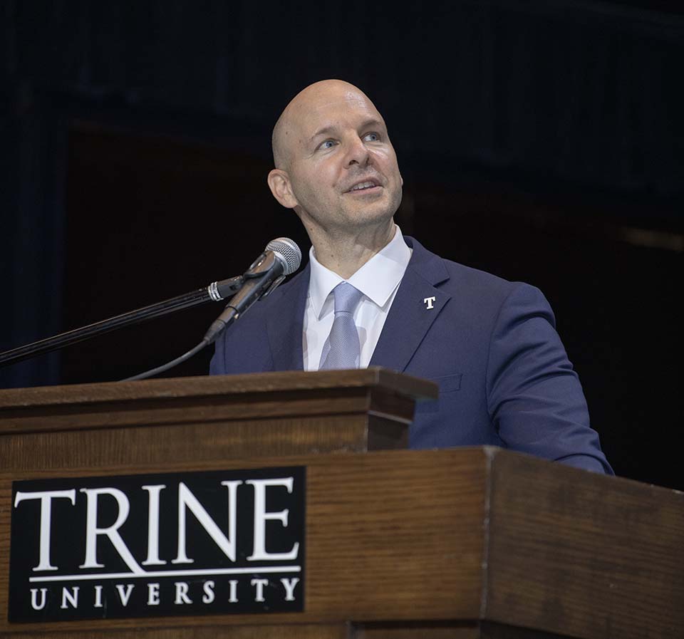 Dr. Tony Kline speaking at podium