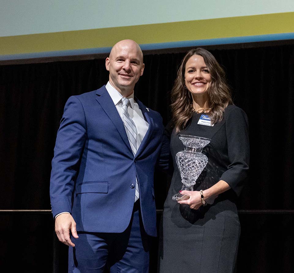 Dr. Kline standing with Angie Logan