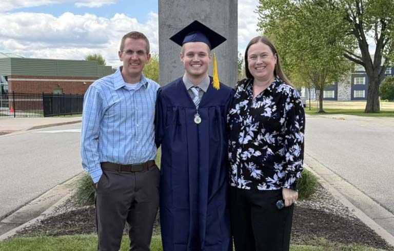 Stephen, Parker and Brooke Pelletier standing near the Ryan Skywalk