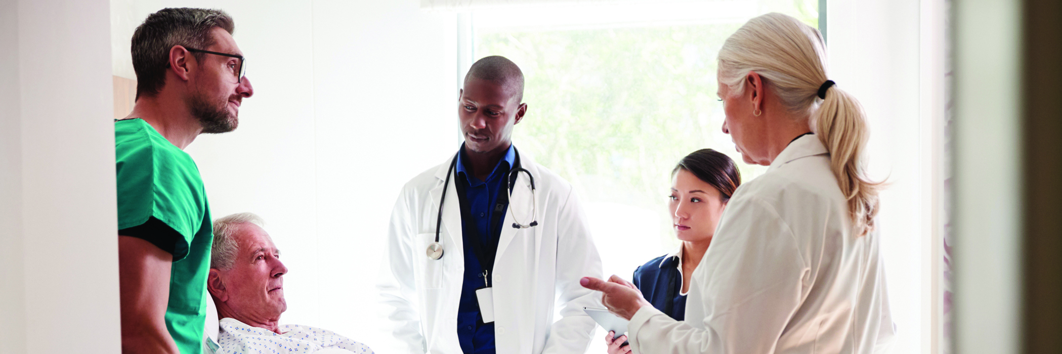 Nurses and doctors with patient