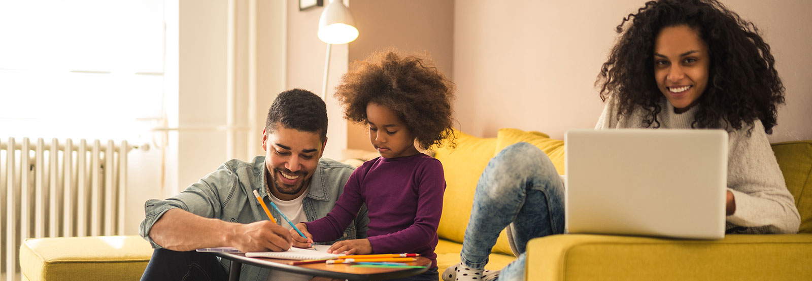 Family playing and studying together