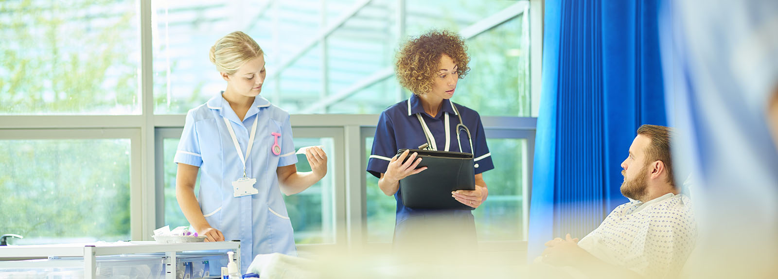 Nurses with a patient